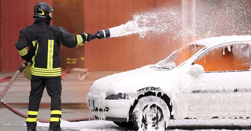 car fire extinguished by firefighter foam